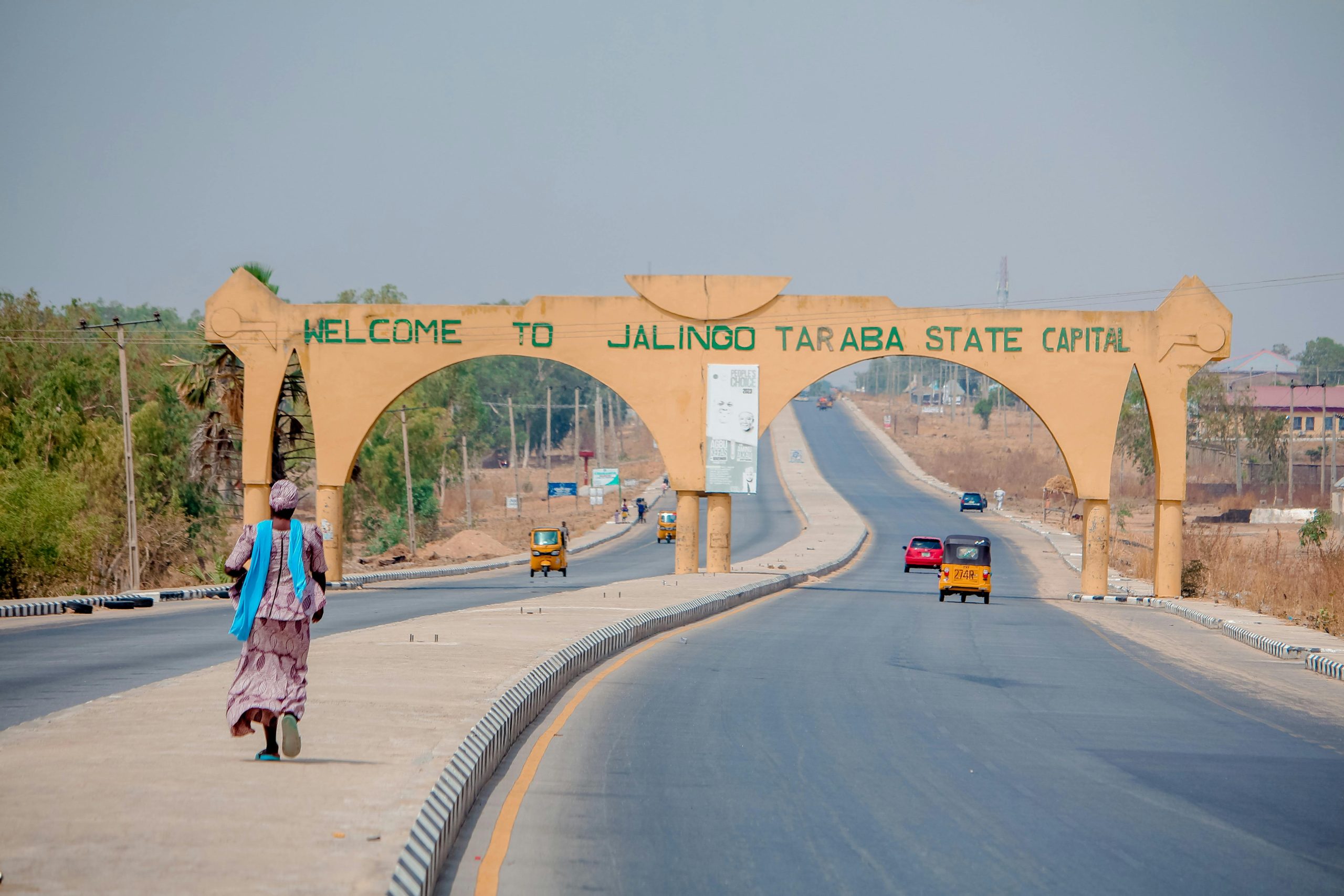 Photograph of a welcome arch on the highway leading into Jalingo, capital of Taraba State, Nigeria.